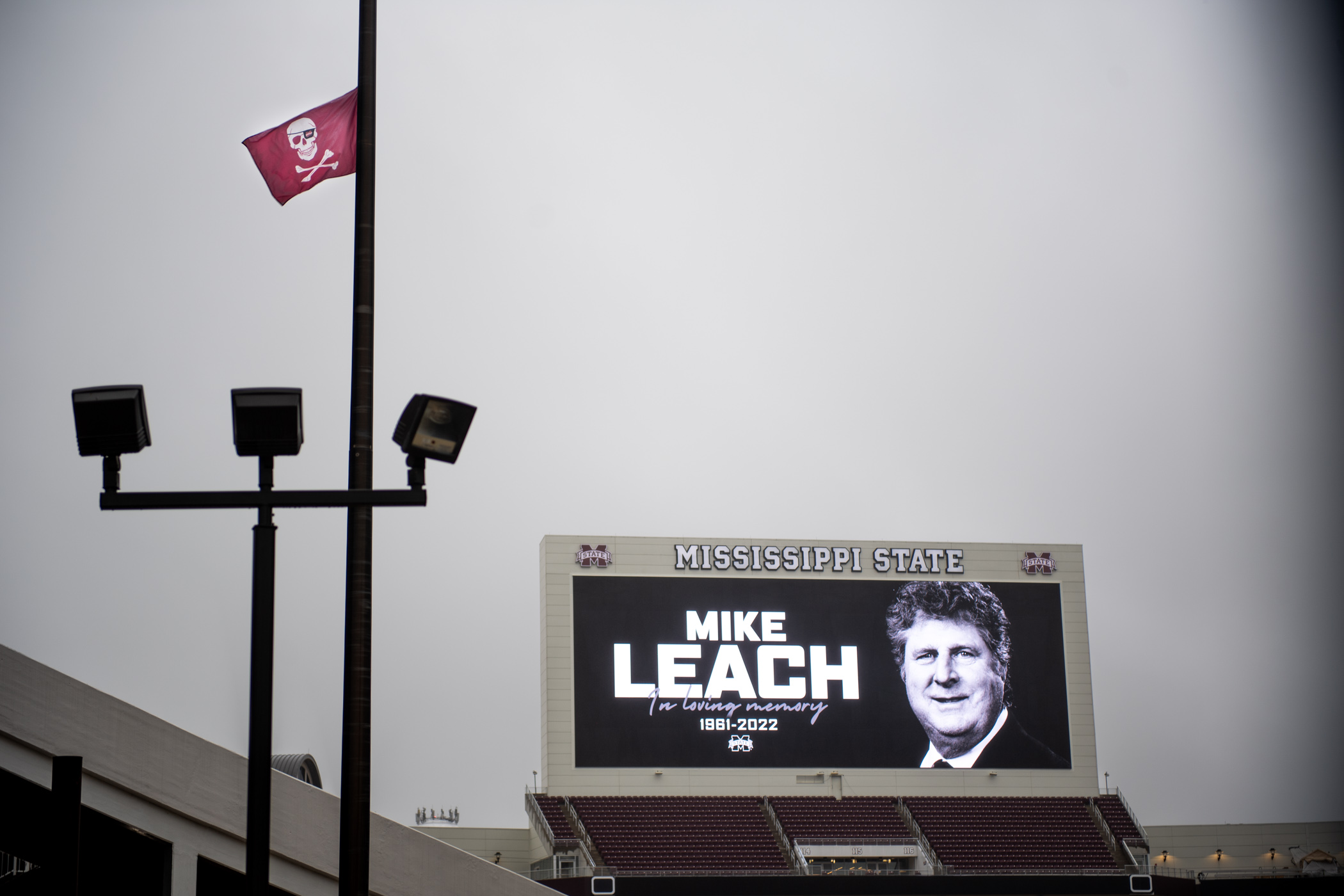 MSU Football displays a memorial message to Coach Mike Leach across the scoreboard of Davis Wade Stadium