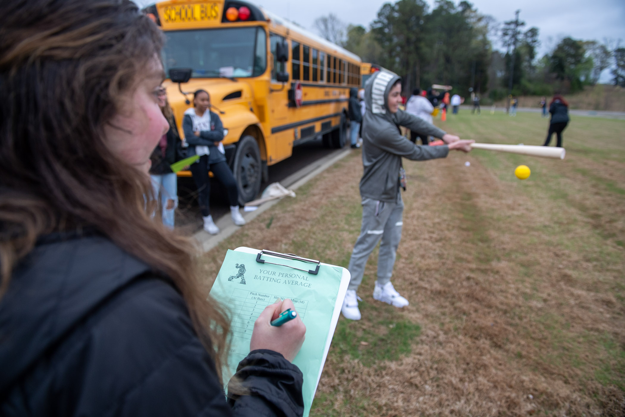 University students in MSU Math Instructor Julie Nations’ class help young learners calculate their batting averages.