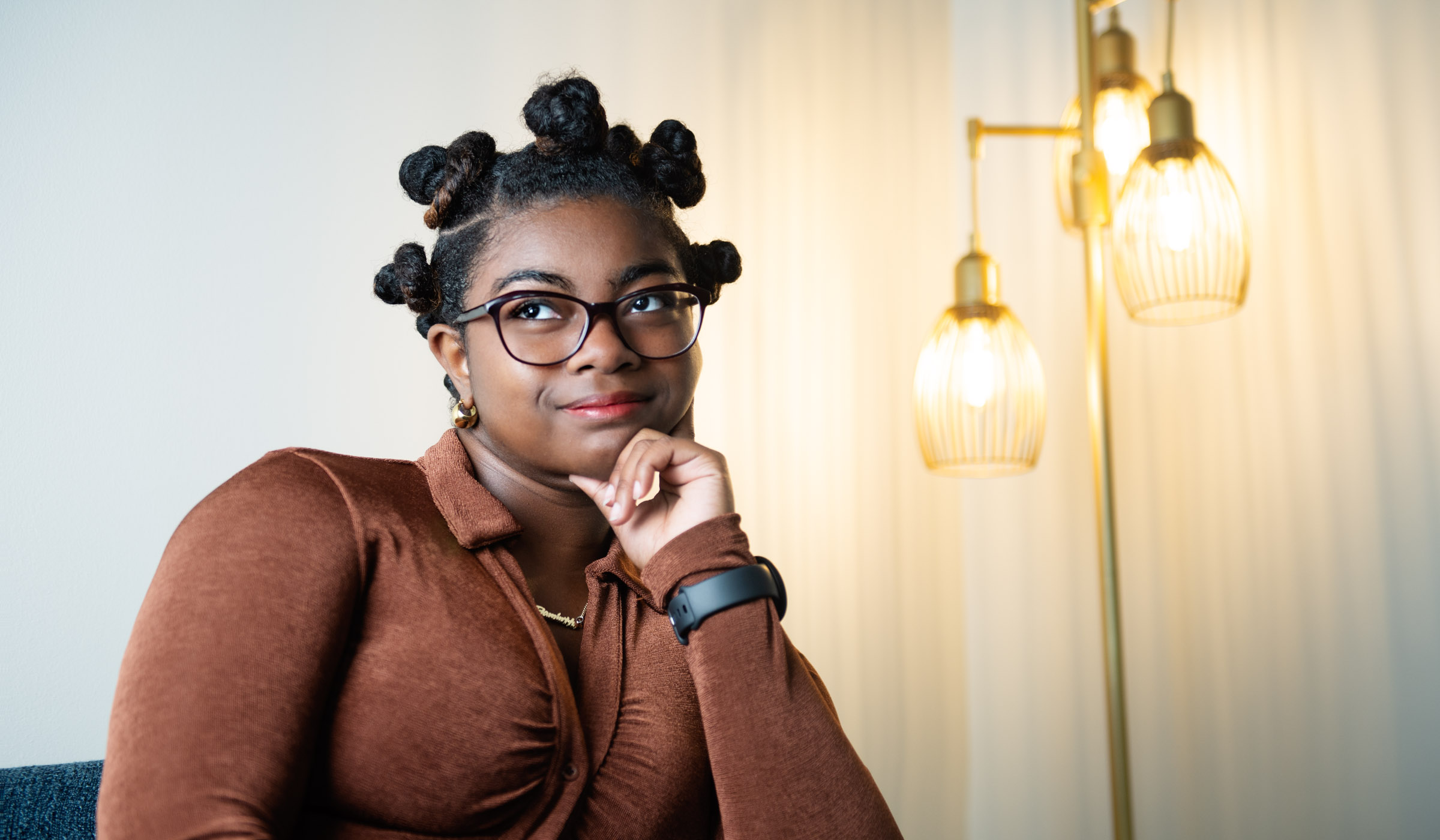 Makayla Smith, pictured inside in front of a lamp.