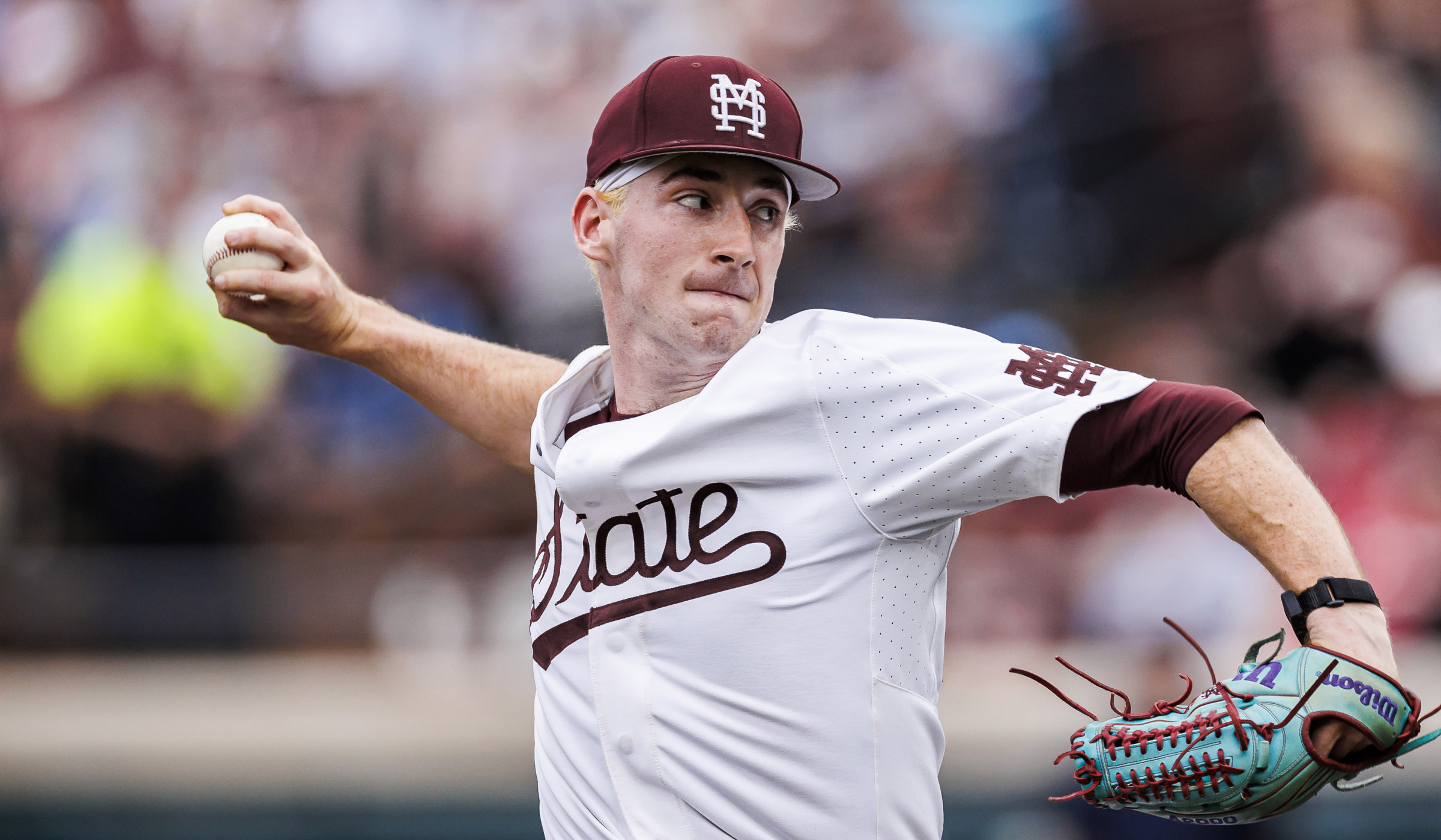 Nate Dohm, pictured pitching during a game for MSU