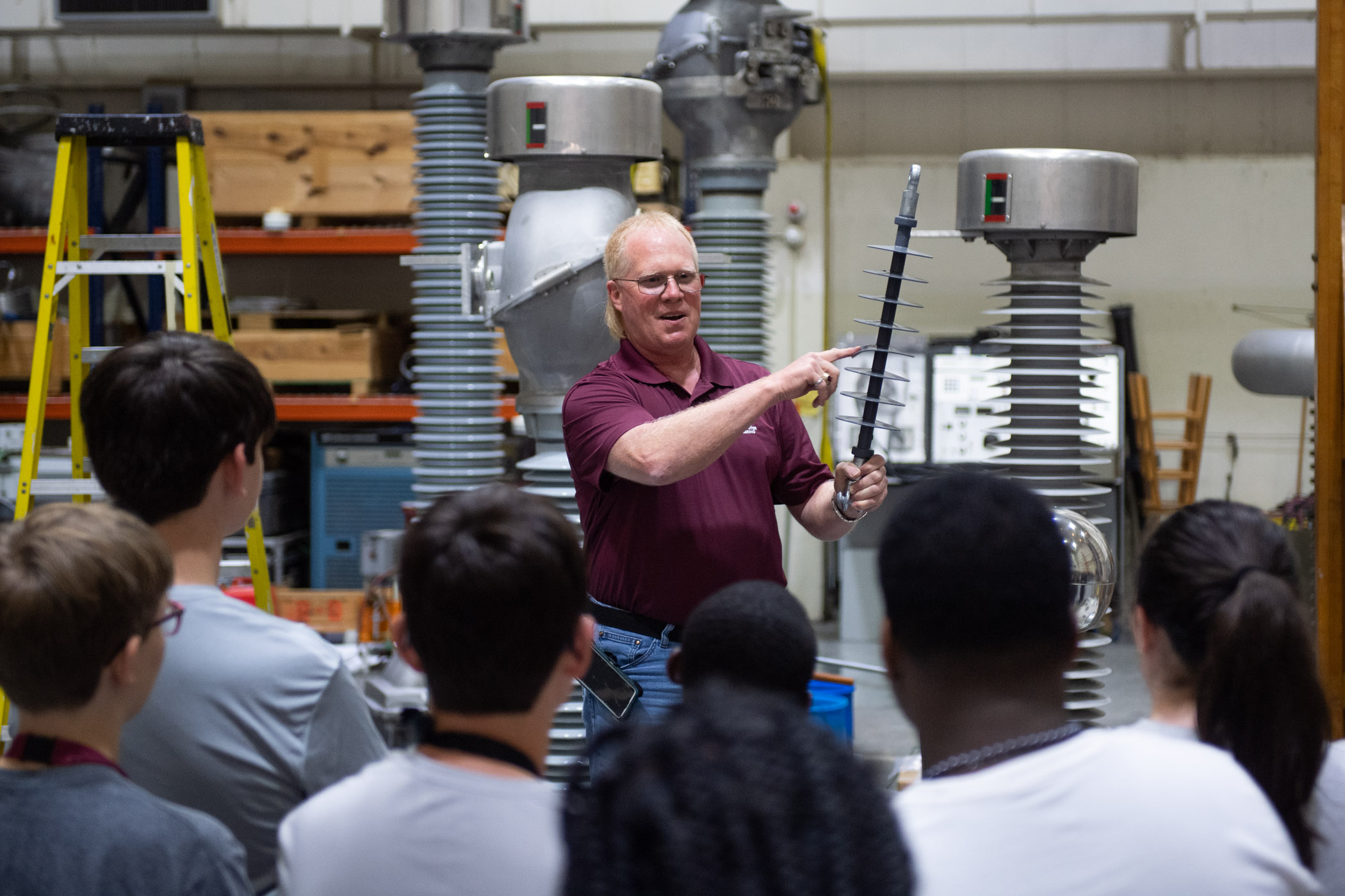 David Wallace talks to students in the Paul B. Jacob High Voltage Laboratory