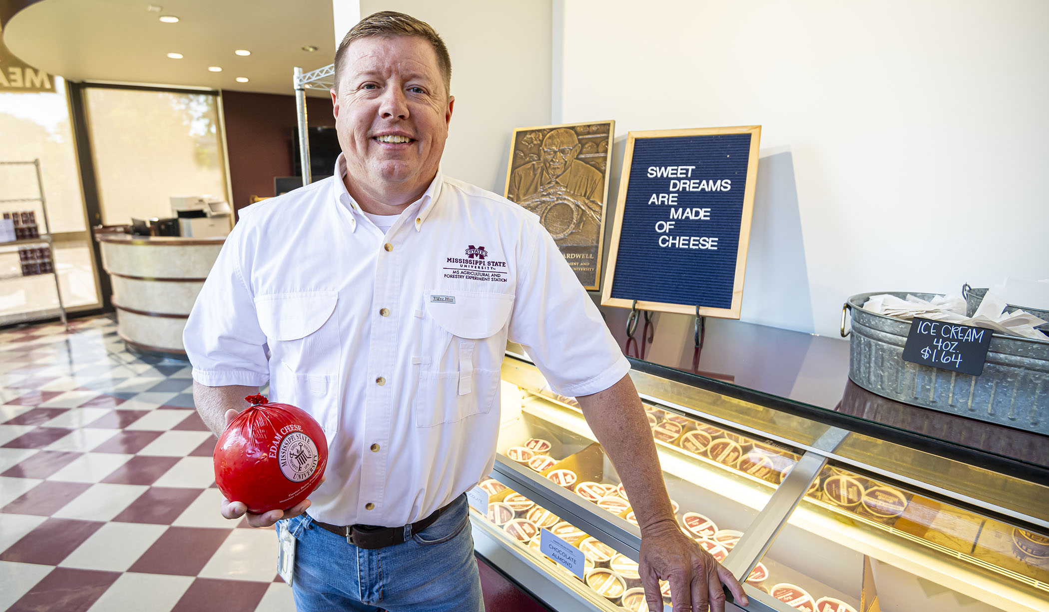 Jay McClelland, pictured holding a ball of Edam cheese.