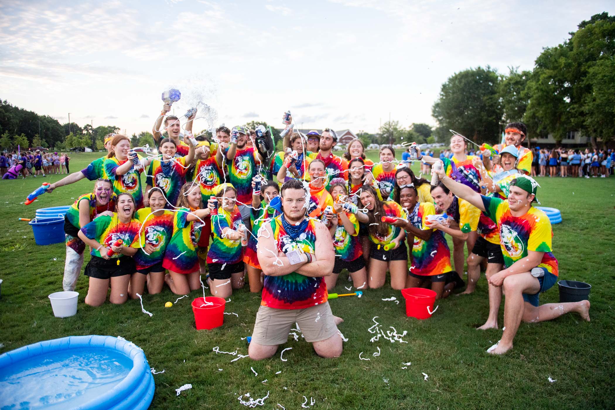 Tyler Adair, center, a senior Industrial Engineering major from Starkville, is showered with love--Maroon Madness style.