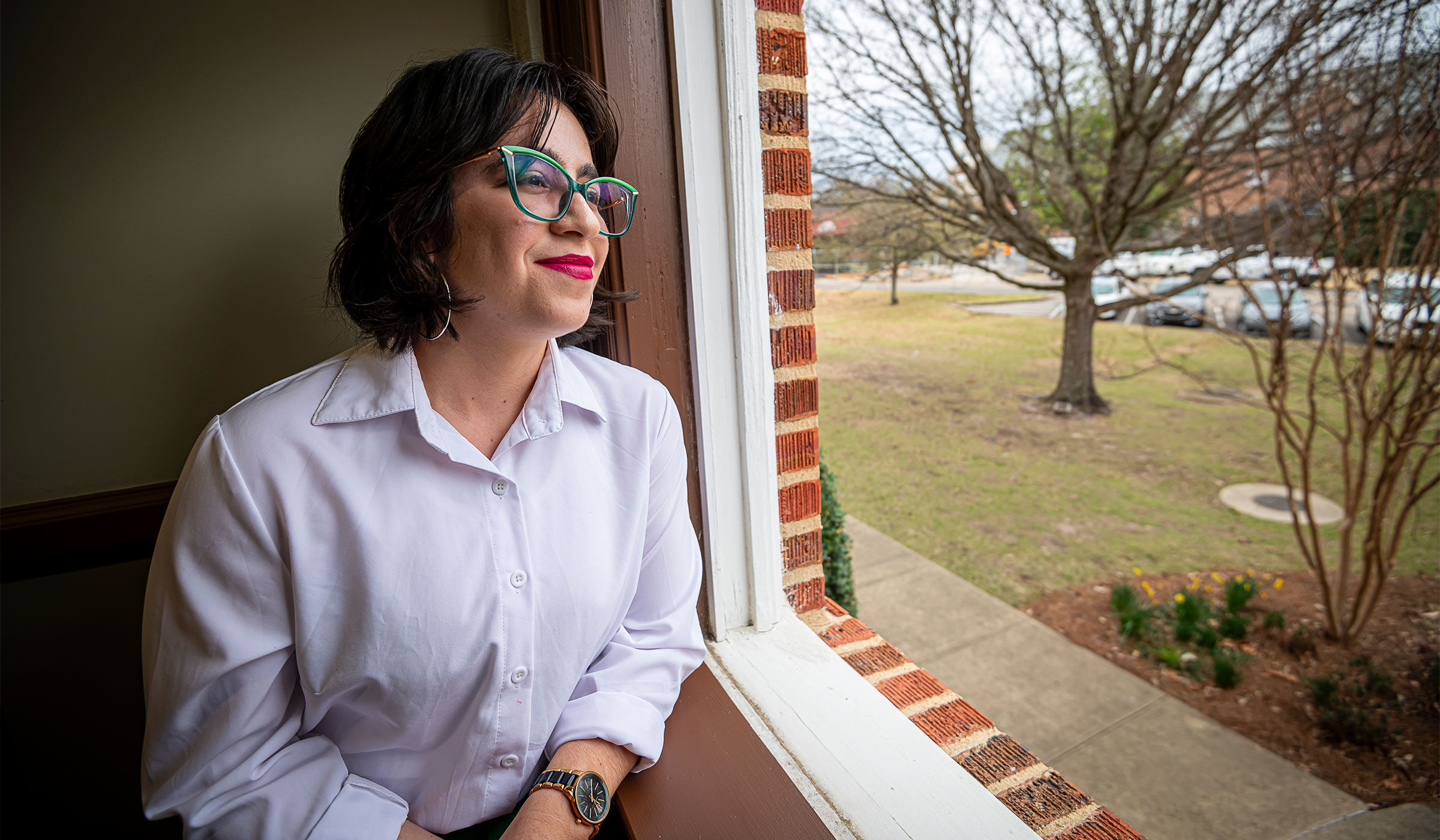 Patricia Marie Cordero-Irizarry looks out a window