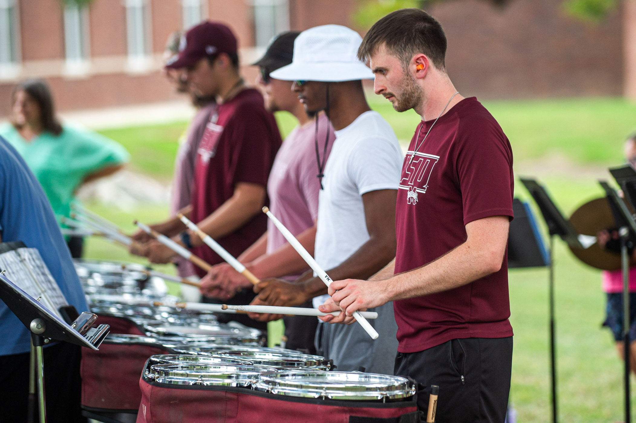 Kyler Greco, a freshman studying civil engineering, practices with the rest of The Famous Maroon Band's drumline at FMB's annual summer band camp, preparing for many loud and proud upcoming Saturdays spent at Davis Wade Stadium.