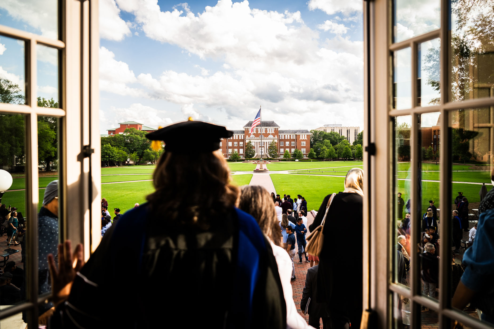 MSU’s newly hooded doctoral graduates step out of historic Lee Hall to embrace their bright futures after Tuesday’s [May 13] Doctoral Graduation and Hooding Ceremony. 