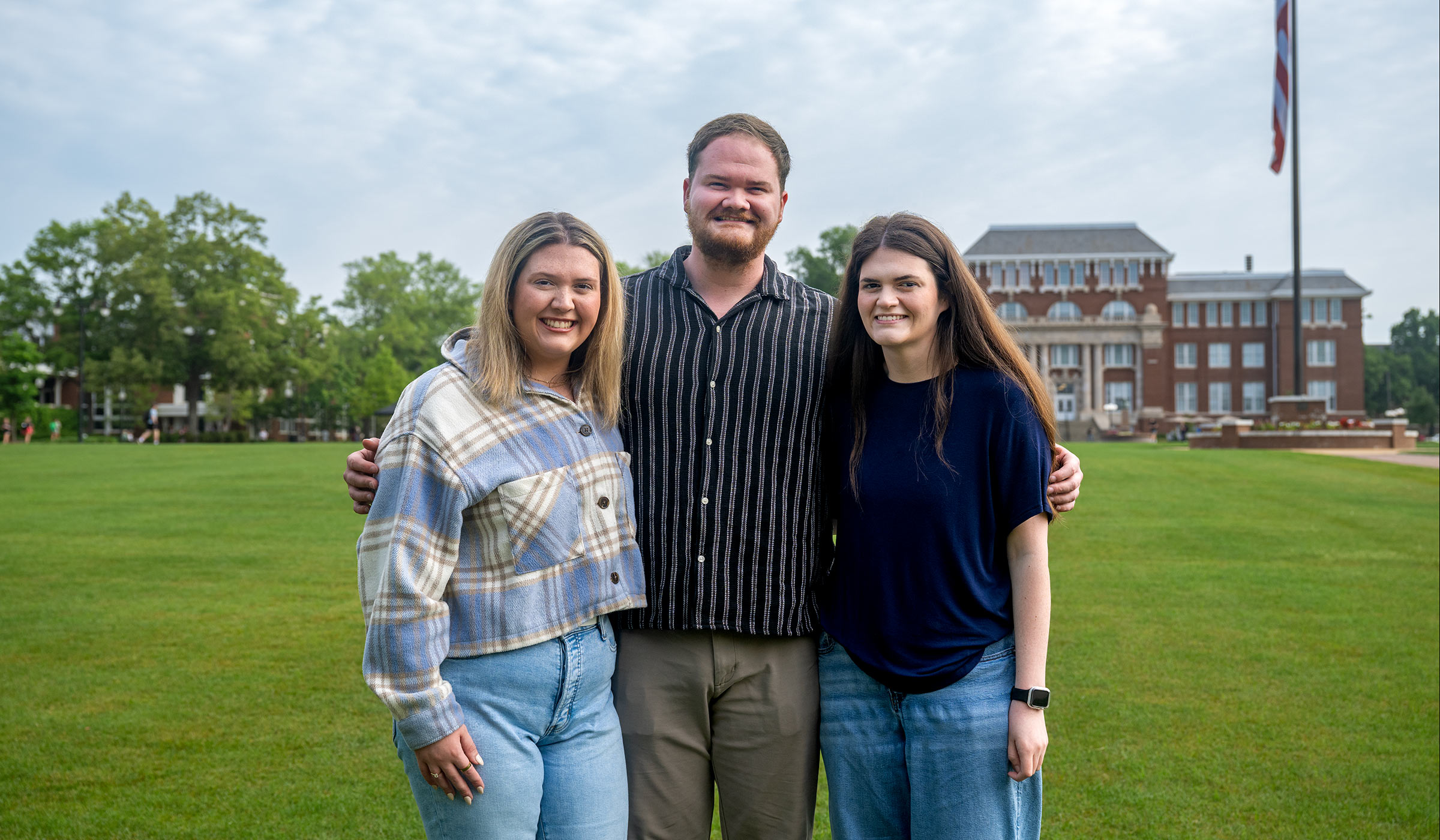 three people on drill field
