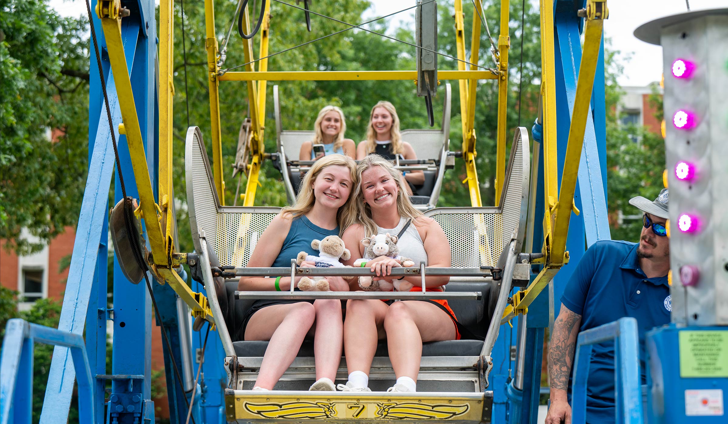 Students ride a ferris wheel in the Junction at the Last Day of Class Carnival
