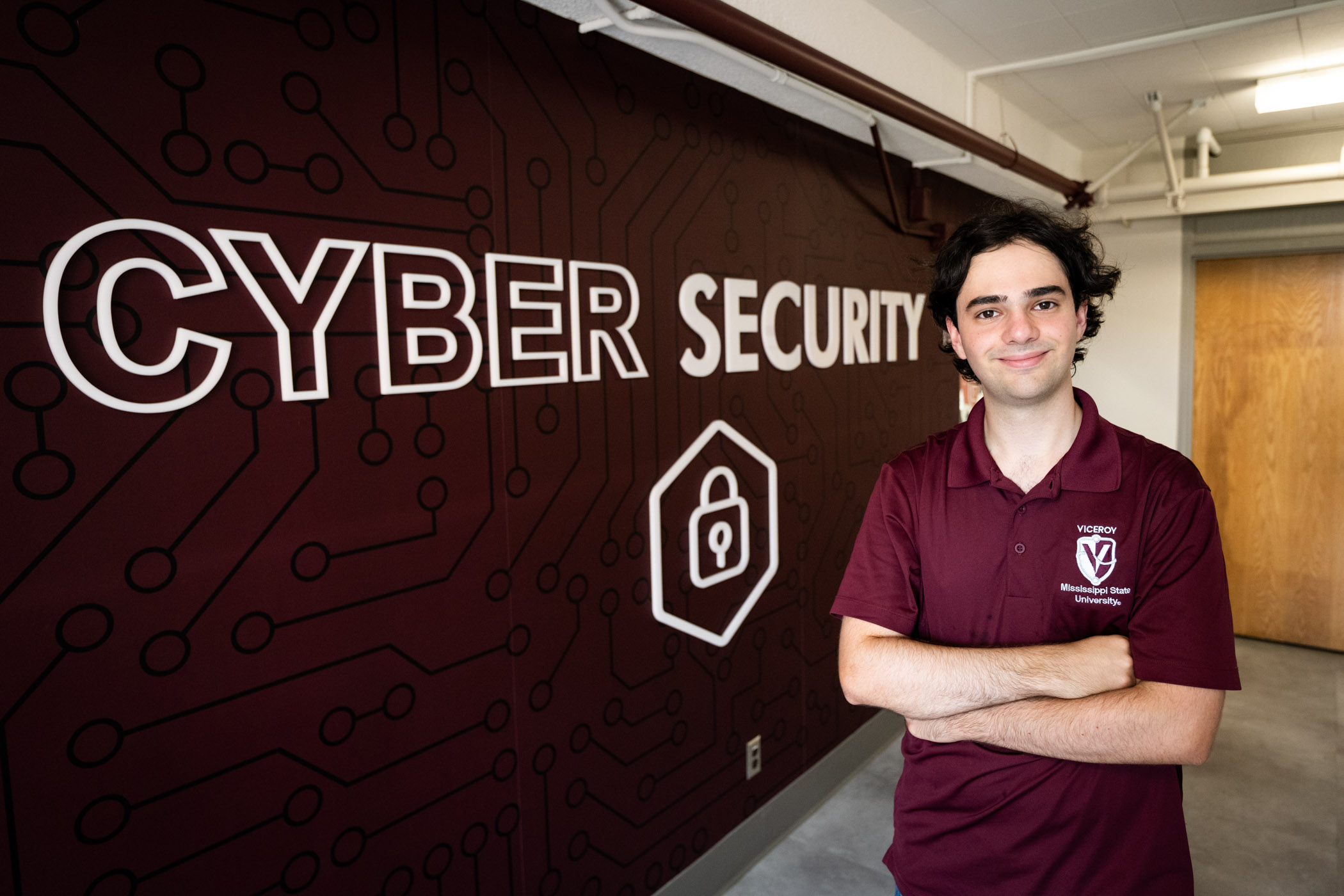 man in maroon shirt
