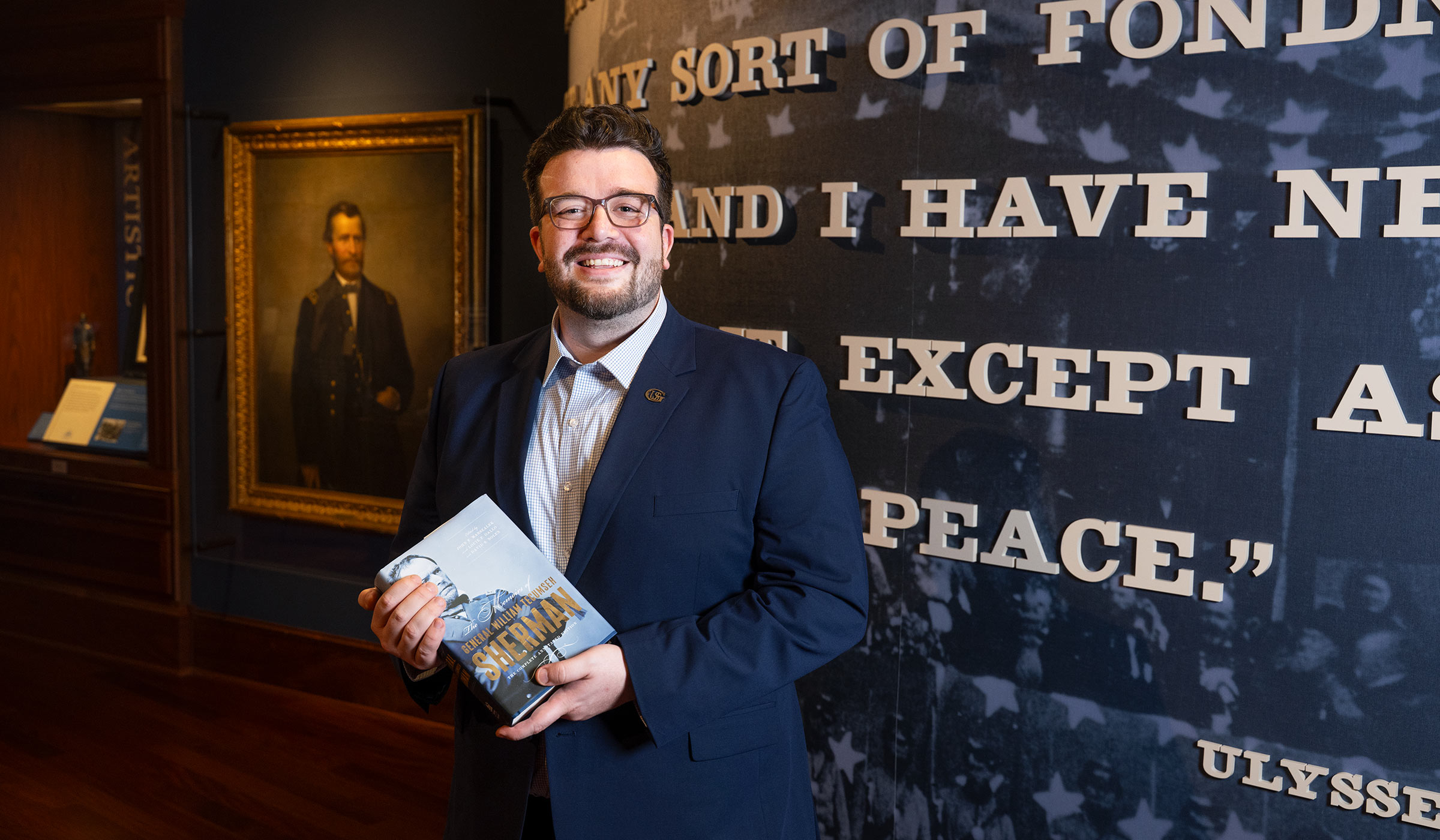 man in front of a sign