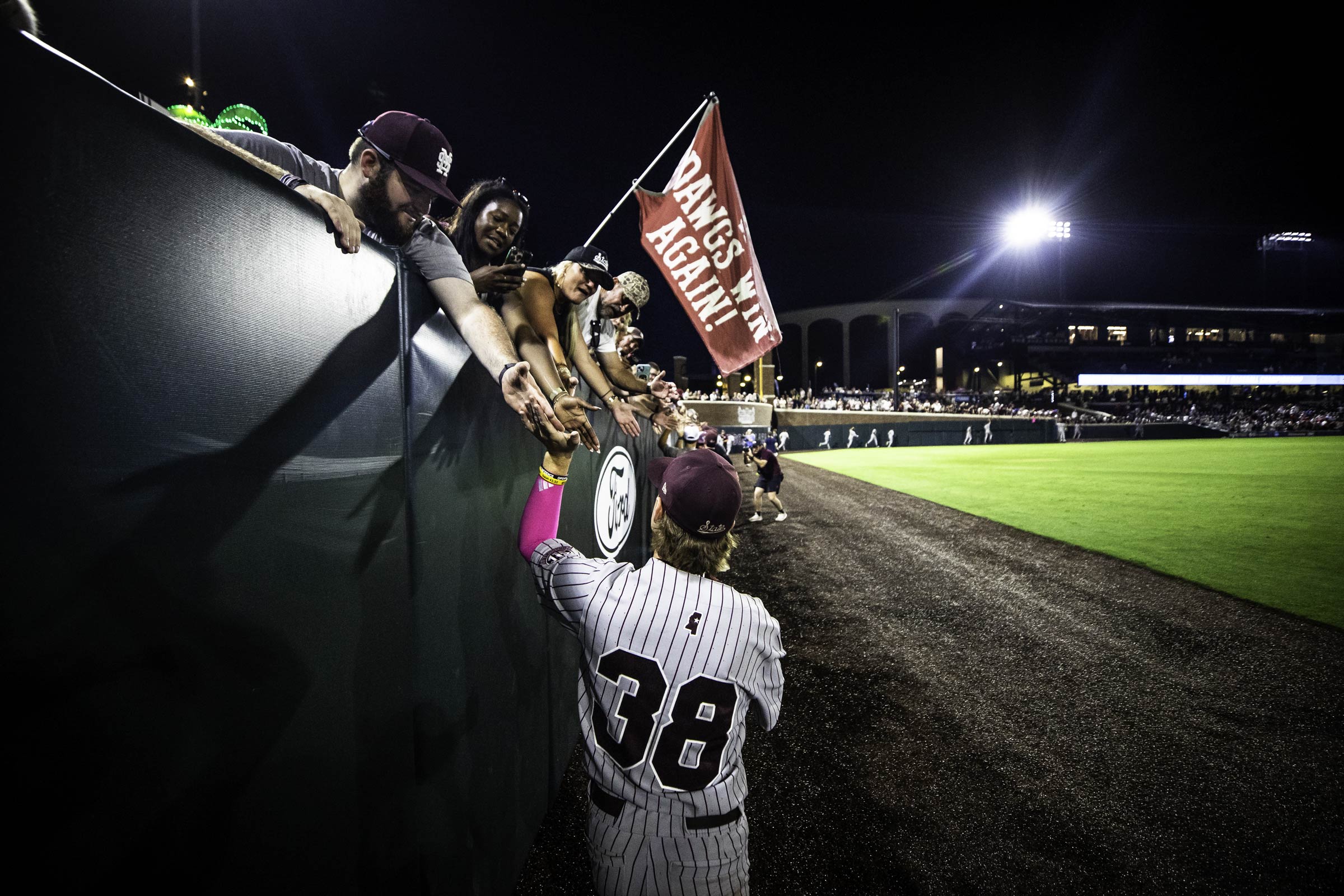 Bryce Chance celebrates with fans at Dudy Noble Field