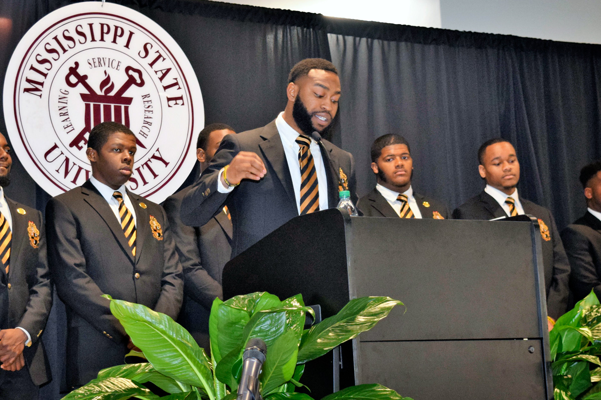 Members of the MSU Kappa Beta Chapter of Alpha Phi Alpha Fraternity make a presentation during the MLK Unity Breakfast. 