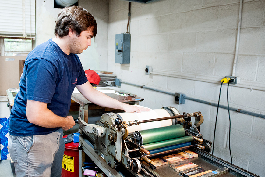 Mississippi State senior art/graphic design major Mitchell S. &amp;quot;Mitch&amp;quot; Phillips of Brandon works on a letterpress project in Assistant Professor Suzanne Powney&amp;#039;s printing class.
