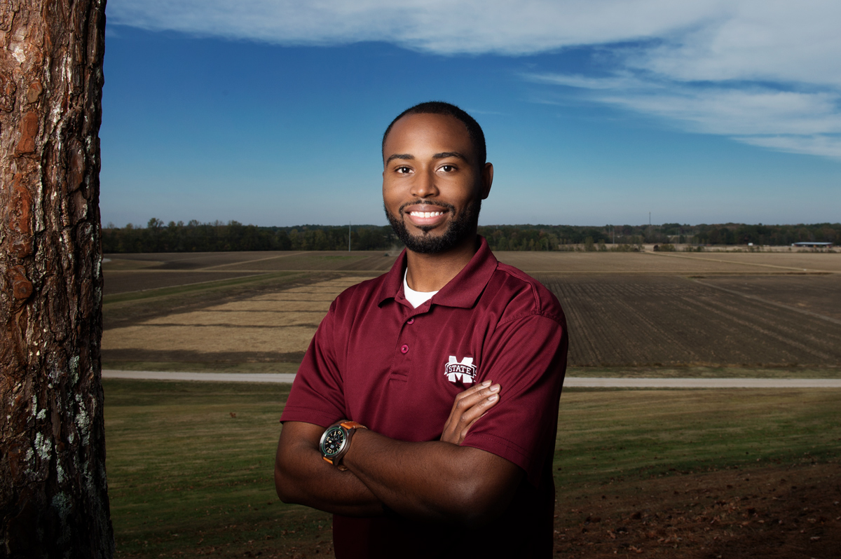 Timothy Bradford, pictured in front of an agricultural field. 