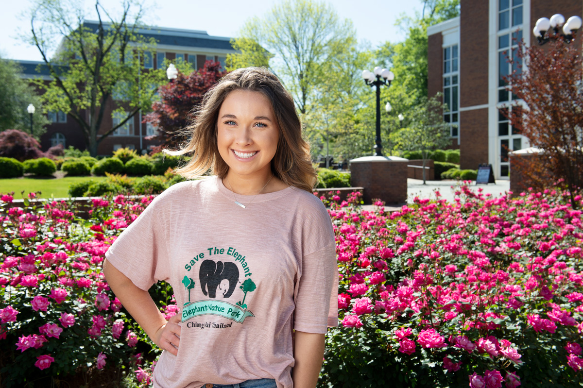 Emily Burns, pictured wearing a &amp;quot;Save The Elephant&amp;quot; sure on the MSU campus.