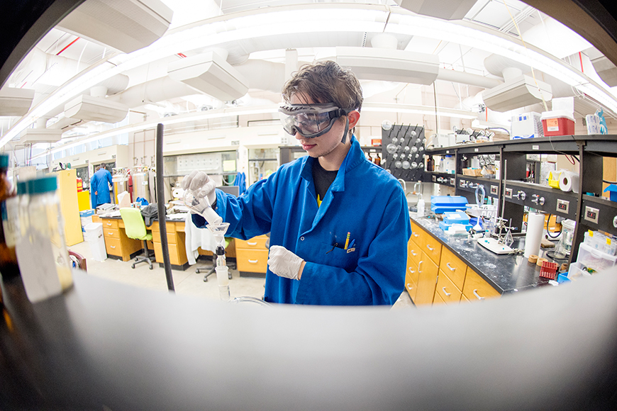 Mississippi State chemistry doctoral student James D. Cope from the United Kingdom filters the product of a reaction in the university&amp;#039;s Hand Chemical Lab.