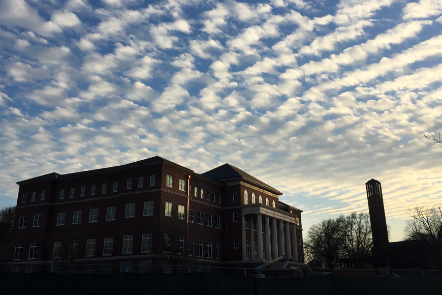 Sunset clouds dominate the sky over the &amp;quot;Old Main&amp;quot; Academic Center and Chapel Tower