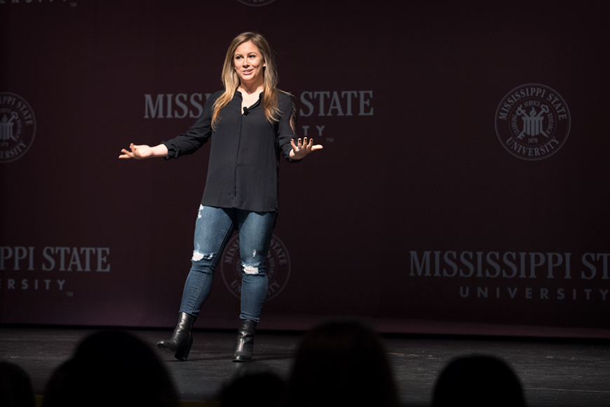 Retired U.S. Olympian Shawn Johnson speaking to students