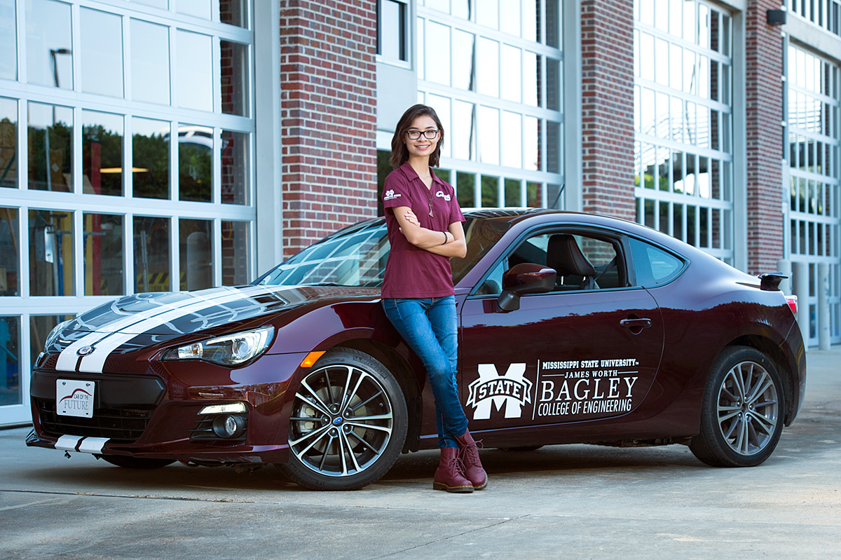 Michelle Price, pictured in front of MSU&amp;#039;s Car of the Future.