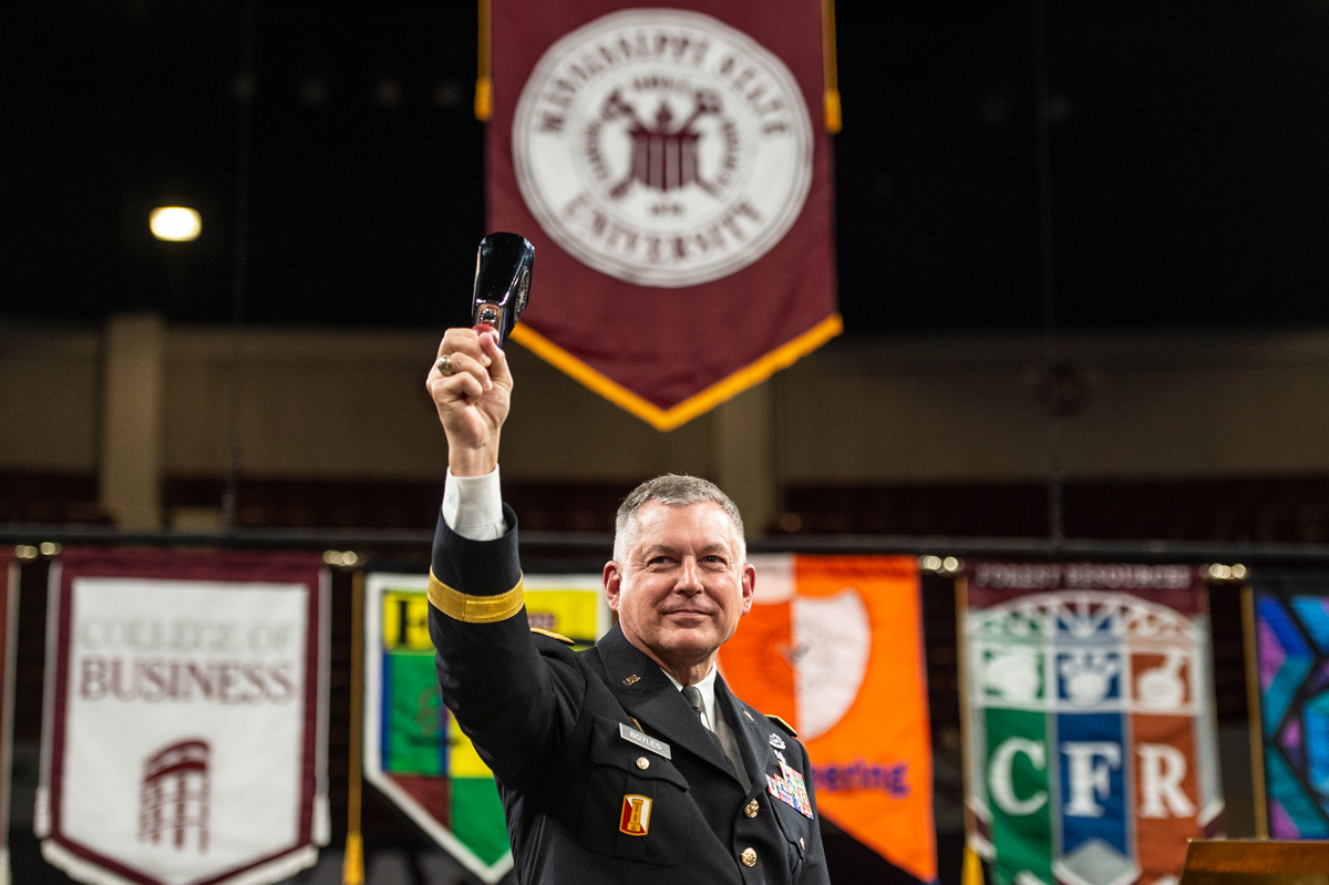 Maj. Gen. Janson D. “Durr” Boyles, Adjutant General of Mississippi’s National Guard rings his gifted cowbell.
