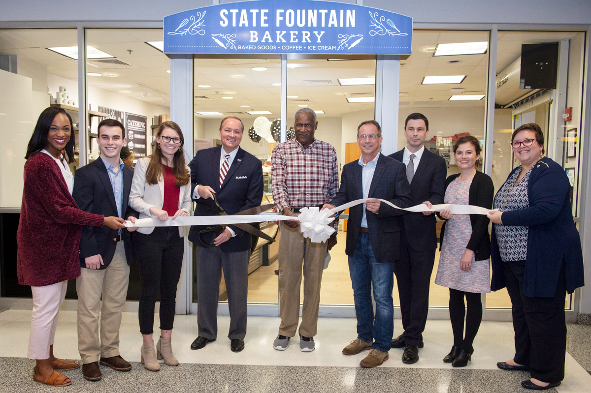 President Keenum and VIPs cut ribbon of new State Fountain Bakery location in Colvard Union.