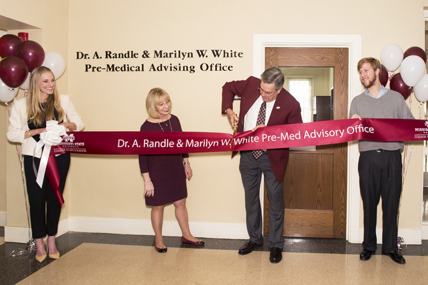 A new academic service dedicated to advising Mississippi State pre-medical majors formally opened Wednesday [Jan. 27]. Celebrating the new Dr. A. Randle and Marilyn W. White Pre-Med Advisory Office with a ribbon-cutting ceremony were (l-r) Morgan Crowley, a senior chemistry/pre-med student from Tupelo; Marilyn White and Dr. Randy White, the office&amp;#039;s namesakes; and Nathan Usry, senior biolgoical sciences/pre-med student from Clinton. 
