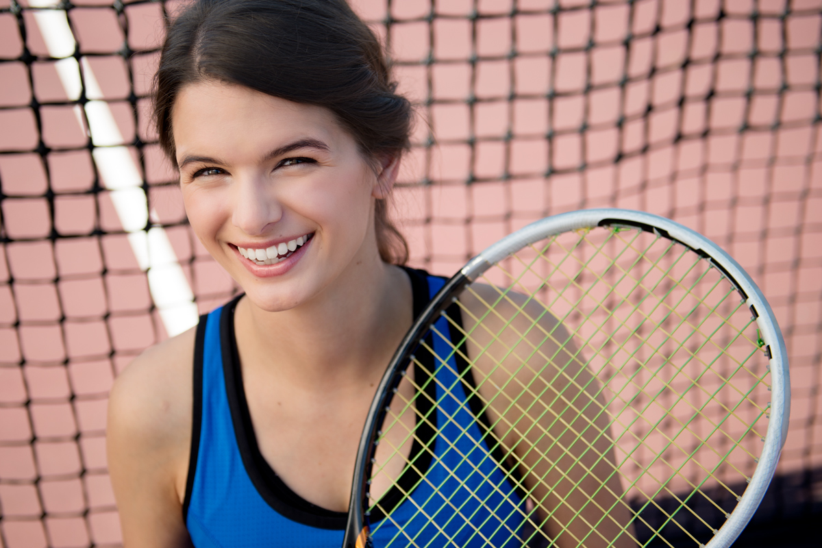 Katie Wood, pictured on a tennis court.