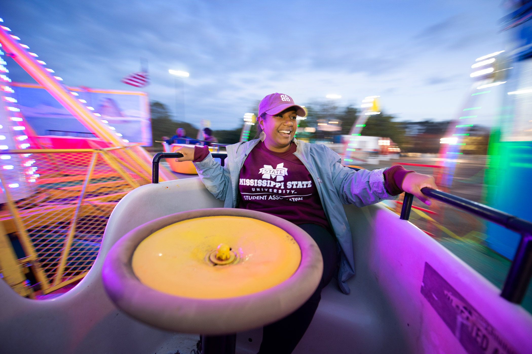 Ella Stevenson (Student Association Director of Programming) rides one of the spinning Carnival rides.