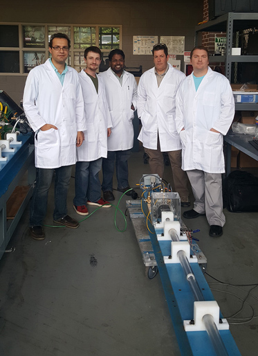 Mississippi State University and Cardiff University researchers collaborate at MSU’s Center for Advanced Vehicular Systems. Pictured, from left to right, are MSU doctoral student Hamed Bakhtiary, CAVS student worker Jonny Miller, MSU Assistant Professor of Agricultural and Biological Engineering Raj Prabhu, Cardiff University Senior Lecturer Mike Jones and CAVS Research Engineer III Wilburn Whittington. (Submitted photo)