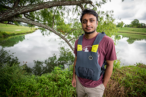 Amit Talukder in a life jacket prototype 