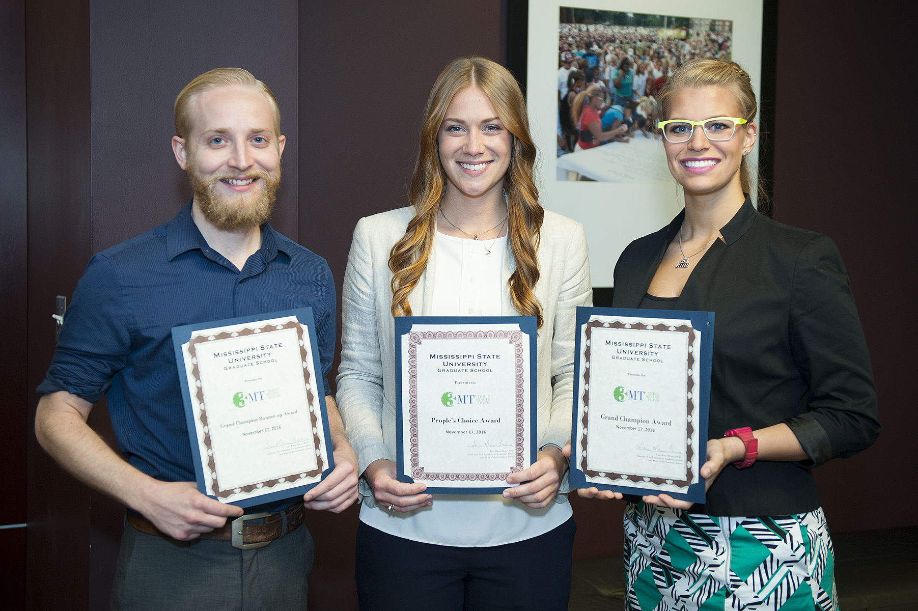 Award winners at MSU’s fourth annual Three Minute Thesis competition included, from left, David S. Mason, a master’s student in biological sciences/botany, Grand Champion Runner-Up; Abbey E. Wilson, a life sciences/animal physiology doctoral student, People’s Choice Award; and Caitlin J. Wenzel, a master’s student studying veterinary medical science, Grand Champion. (Photo by Russ Houston) 