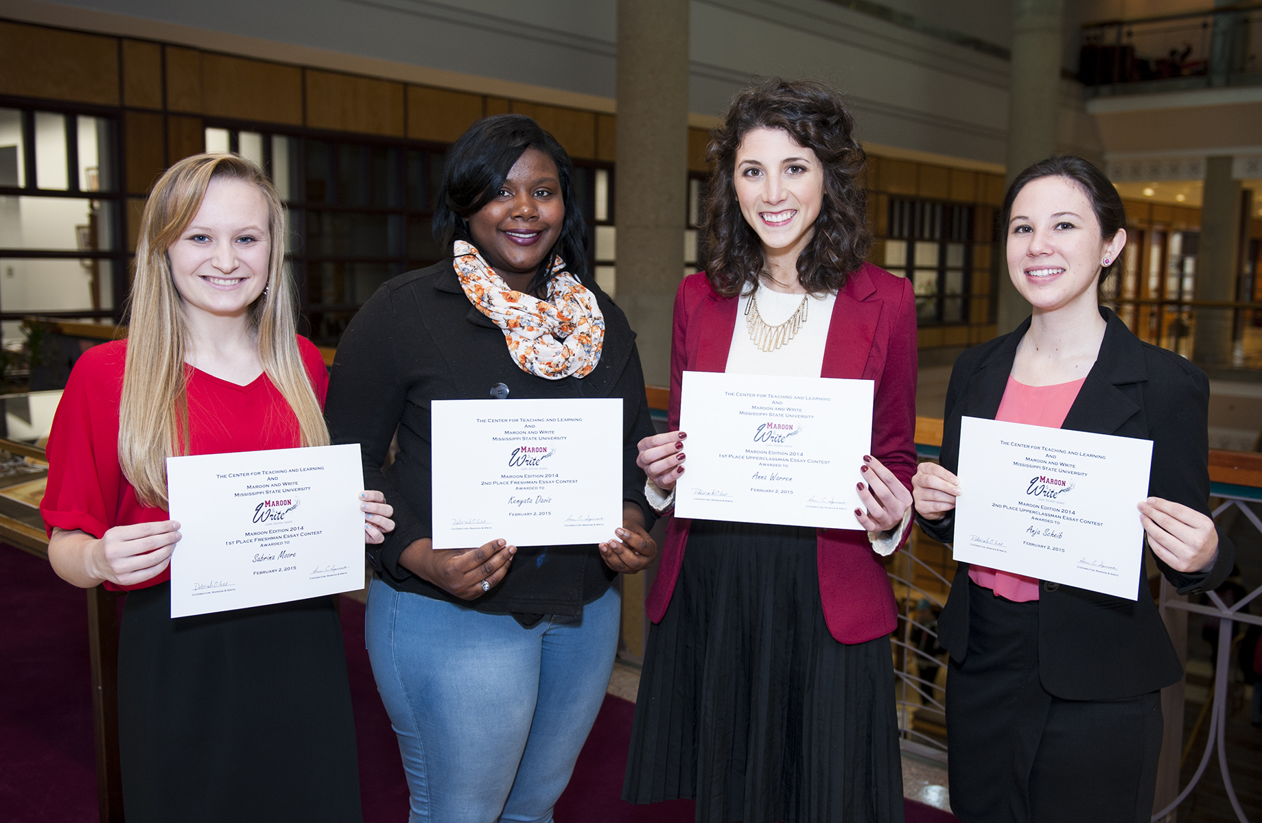 MSU's 2014-15 Maroon Edition Essay Contest winners include (l-r) Sabrina E. Moore of Starkville, Kenyata S. Davis of Kosciusko, Anna M. Warren of Collierville, Tennessee, and Anja C. Scheib of Canton. Not pictured are Kelsey E. Green, also of Starkville, and Tayler Watson of Clinton.