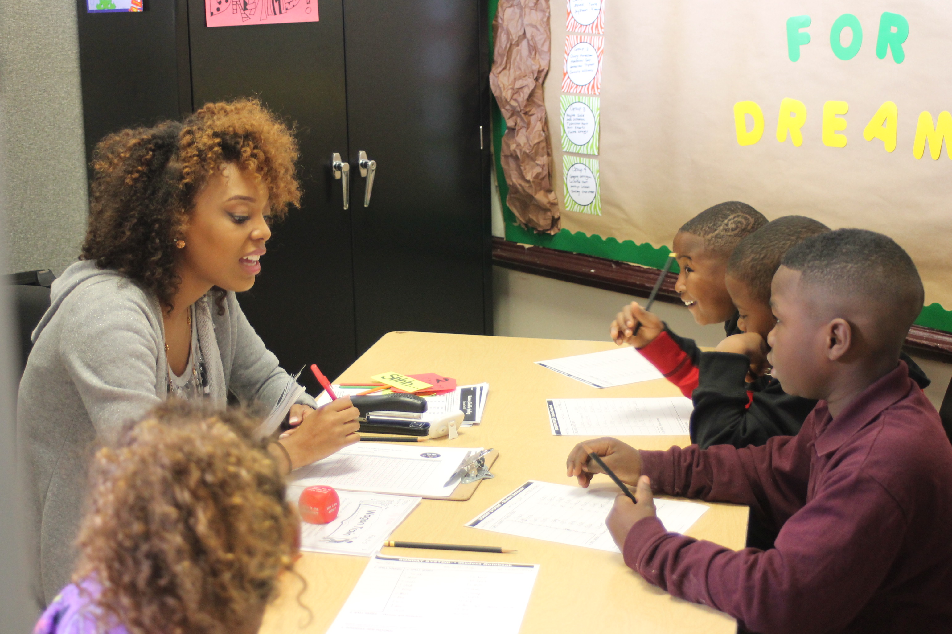 Participating in the DREAMS in-school program at Fair Elementary School are, from left, student Avery Forrester, MSU Interventionist Tiffon Moore, students Vontavious Triplett, Montgevious Goss and Carmello Williams. 