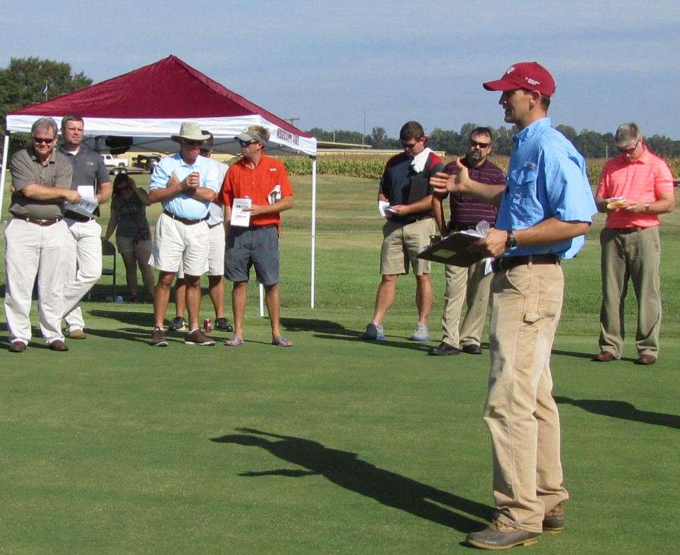 MSU graduate student Phillip Vines, presenting results of his research to turfgrass professionals attending a campus field day.