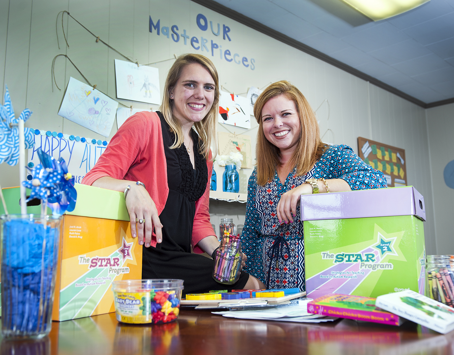 School psychology doctoral students Molly Butts, left, and Hallie Smith, enjoy working as autism liaisons at the university's Autism and Developmental Disabilities Clinic.