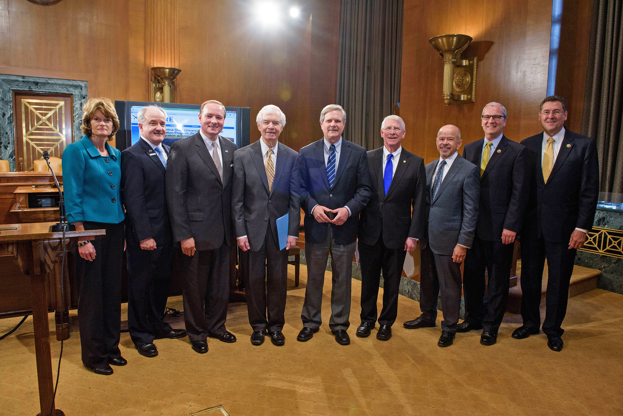 Members of the U.S. Senate and House of Representatives met Thursday, May 14, for a news conference to discuss the next steps and goals for the newly-named Unmanned Aerial Systems Center of Excellence (UAS COE), a consortium of universities that will research and develop technologies and policies for the use of unmanned aerial systems in the United States. The Federal Aviation Administration (FAA) has named the Alliance for System Safety of UAS through Research Excellence (ASSURE), a consortium of universities headed by Mississippi State University, to lead the UAS COE. Included in the press conference are, from left, Sen. Lisa Murkowski (R-Alaska); retired Maj. Gen. James Poss, U.S. Air Force, ASSURE UAS executive director; President Mark Keenum, Mississippi State University; Sen. Thad Cochran (R-Miss.); Sen. John Hoeven (R-N.D.); Sen. Roger Wicker (R-Miss.); FAA Administrator Michael Huerta;  Rep. Kevin Cramer (R-N.D.); and Rep. Gregg Harper (R-Miss.).