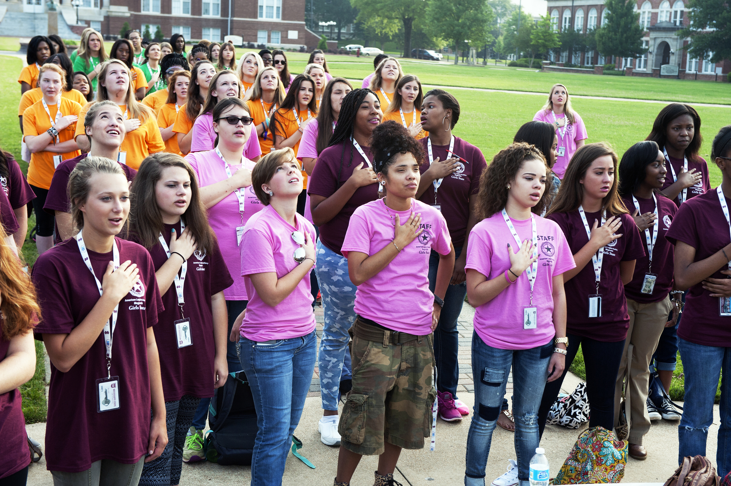 Girls State participants recite the Pledge of Allegiance at MSU's Drill Field Monday [June 8] to start the week's activities.