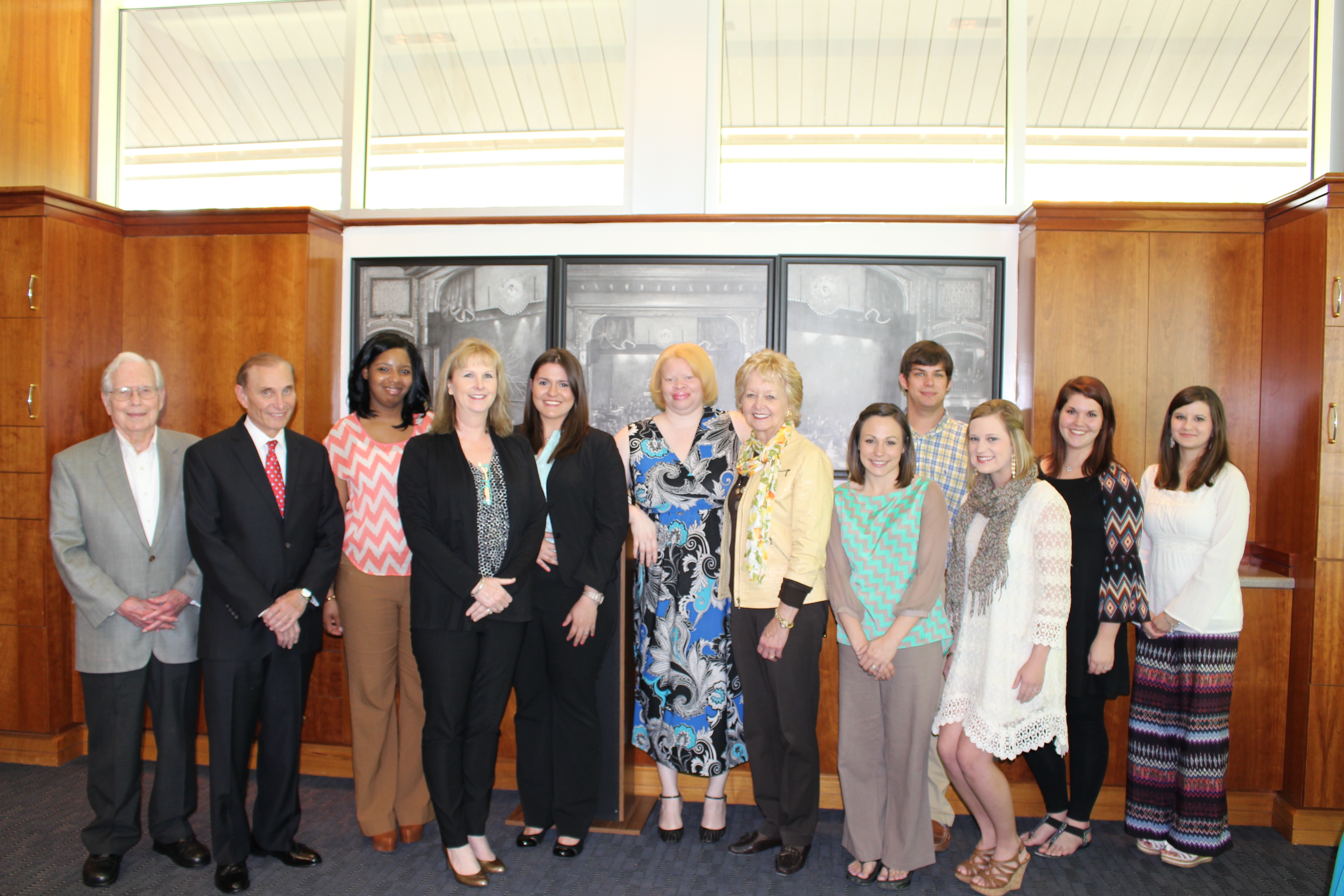Riley Foundation board members met with Riley Scholars during a recent reception. From left, Robert B. Deen Jr., foundation president and chairman of the board; Marty Davidson, vice president and treasurer; Riley Scholar Shenekia Jenkins; Becky Farley, foundation board executive director; and scholars Luiza Dobbins; and Tracie Buckley; foundation board member Christine Riley; scholars Erika Clark; Trevor Ayllon; Tiffany Dorman; Ashley Godwin; and Kristien Long. Not pictured are scholars Kasi McIntosh and Kelly Williamson. Riley Foundation board members met with Riley Scholars during a recent reception. From left, Robert B. Deen Jr., foundation president and chairman of the board; Marty Davidson, vice president and treasurer; Riley Scholar Shenekia Jenkins; Becky Farley, foundation board executive director; and scholars Luiza Dobbins; and Tracie Buckley; foundation board member Christine Riley; scholars Erika Clark; Trevor Ayllon; Tiffany Dorman; Ashley Godwin; and Kristien Long. Not pictured are scholars Kasi McIntosh and Kelly Williamson.