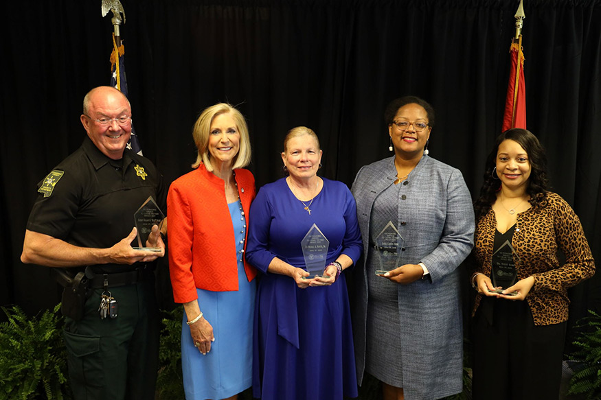 MSU’s Yvett Roby, director of the Office of Survivor Support, far right, is pictured along with other recent honorees, from left, Lauderdale County Sheriff William D. “Billy” Sollie; Mississippi Attorney General Lynn Fitch who presented the awards; Jennifer Boutte, accepting an award for her late husband Lt. Michael Anthony Boutte Sr.; and Hinds County Court Judge Carlyn Hicks. 