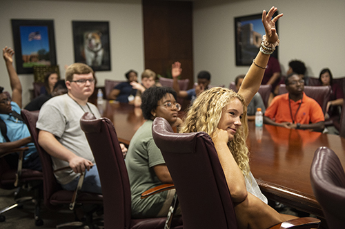 Anna Darty, a high school senior from Birmingham, Alabama, raises her hand during a discussion with Mississippi State Office of Admissions and Scholarships personnel as part of ASAP (Accelerating Students into the Accounting Profession) Summer Camp. The innovative accounting program is hosted by MSU’s Richard C. Adkerson School of Accountancy. (Photo by Logan Kirkland)