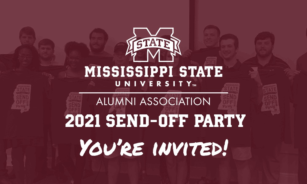 New students smile while holding maroon T-shirts at an MSU Alumni Association Send-Off Party