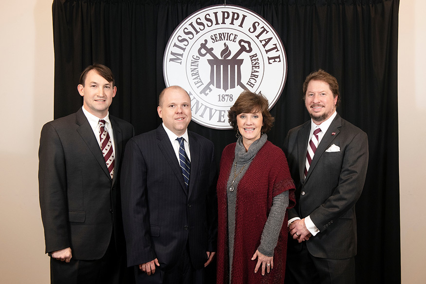Mississippi State University Alumni Association national officers Brad M. Reeves, Riley Nelson, Sherri Carr Bevis and Patrick White.