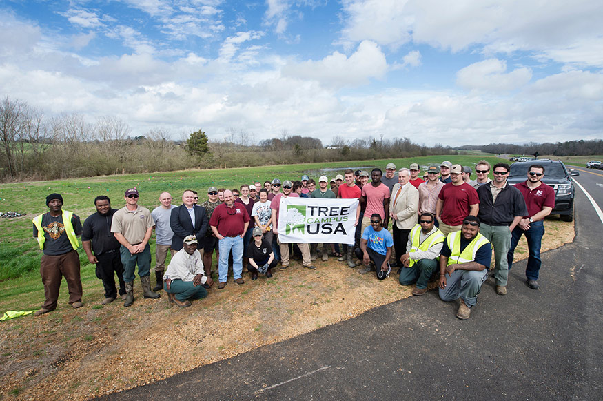 Members of the MSU Student Chapter of the Society of American Foresters, along with Waldorf Endowed Scholars, came together with MSU faculty and staff to plant 400 trees along Hail State Boulevard in observance of Arbor Day Feb. 21. (Photo by Megan Bean)