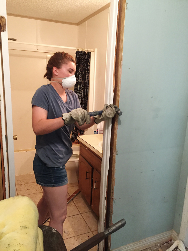 Junior building construction science major Cora N. Howell of Kitty Lake, Alaska, was among a group of Mississippi State students who assisted with home repairs following last month’s historic flooding in south Louisiana. (Photo submitted by Laura Mitchell)