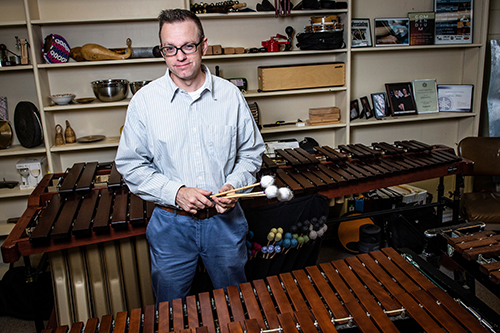 Jason Baker, pictured with a set of xylophones, is an MSU associate professor of music who has recently published a new book of compositions for timpani. (Photo by Logan Kirkland)