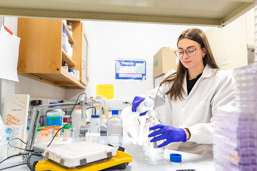 A student works in a lab setting at MSU