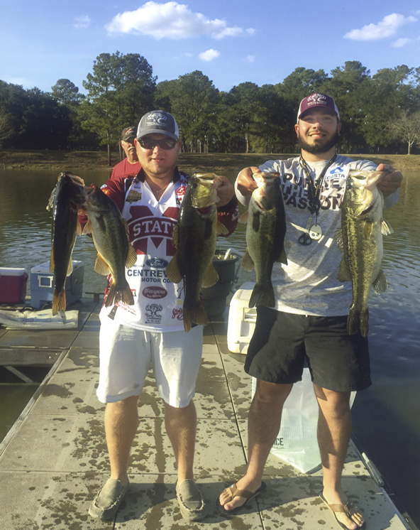 From left, Mississippi State Bass Fishing Club members Caleb Hebert and Jack Stegall show off catches that earned them a second-place finish in the recent YETI FLW College Fishing Southeastern Conference bass tournament on Lake Seminole in Georgia. The duo will go on to represent Mississippi State in the 2018 YETI FLW College Fishing National Championship. (Submitted photo)