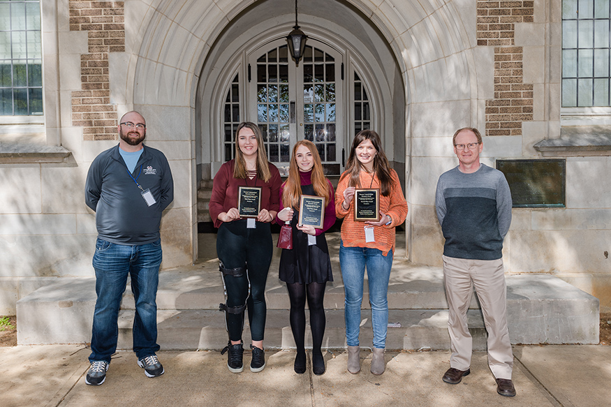 Student winners in the Biological Sciences Research Symposium pictured in front of Harned Hall