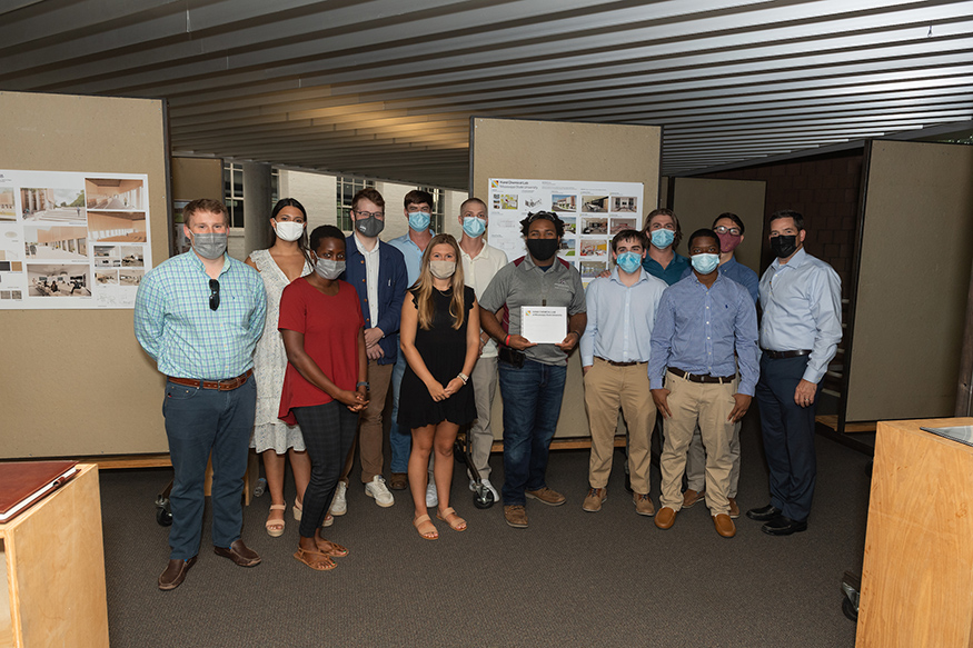 The winning team poses for a group photo following the Brasfield & Gorrie Student Design Competition.