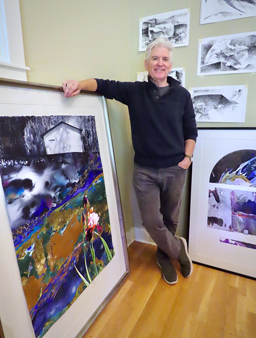Mississippi State University Professor Emeritus Brent Funderburk stands in his studio with his watercolor painting "From Who I Am to Where I Am Going."